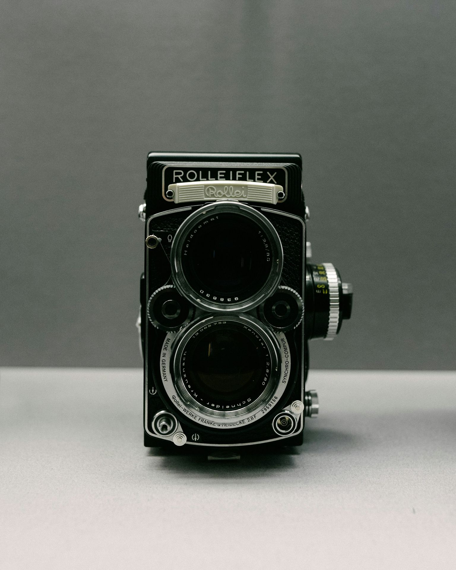 a black camera with a lens